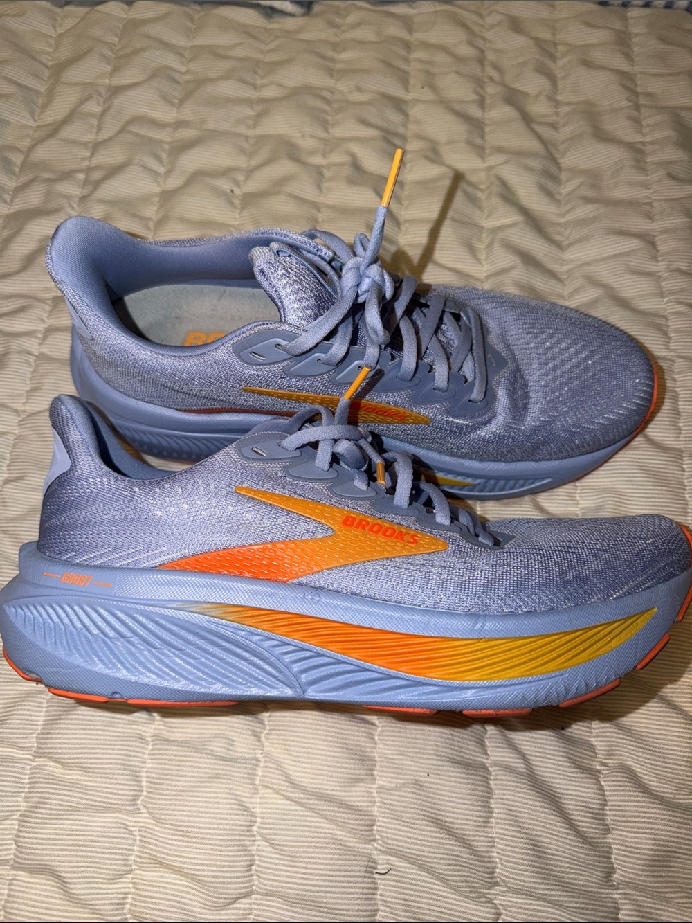 Women’s Brooks Ghost 17 running shoes with orange and yellow accents